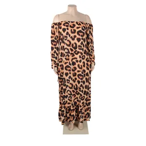 Detailed view of a long sleeve leopard print off-shoulder maxi dress with ruffle hem