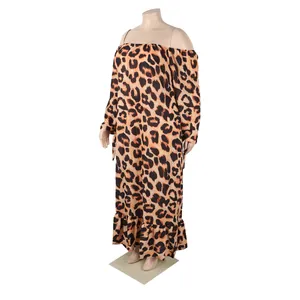 Side view of a plus-size leopard print off-the-shoulder maxi dress with ruffle hem