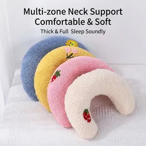 Comfortable U-shaped pet pillow set for cats and dogs, soft neck protection cushions.