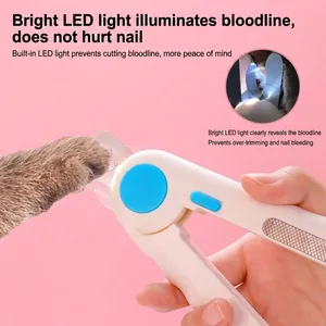 Pet nail clipper with LED light for illuminating bloodline, white and blue finish