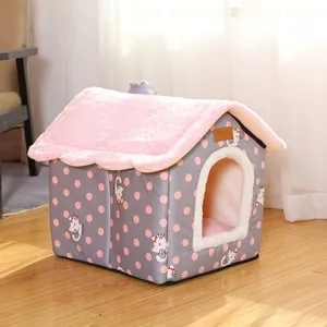 Cozy house-shaped pet bed featuring pink polka dots and a warm soft plush roof for cats and dogs