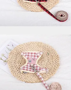 Detailed view of pink plaid cotton cat harness with cute cat patch and matching leash