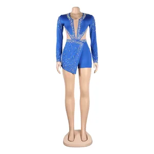 Tuta sexy blu reale a maniche lunghe con pannelli trasparenti in mesh e perle eleganti