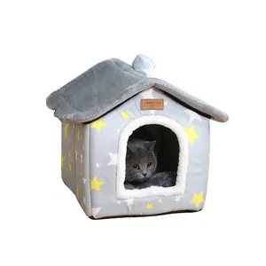 Cozy warm house-shaped cat bed with yellow star patterns and soft gray plush lining