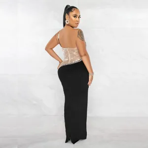 Elegante abito lungo nero sexy con corpino trasparente in mesh e strass visto dal retro