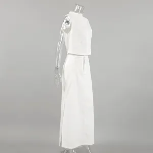Side view of white sleeveless crop top and long skirt cotton linen two-piece set