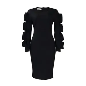 Detailed view of the elegant tiered ruffled sleeves on this black long-sleeved dress