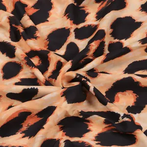 Macro view of sexy leopard print fabric for slim-fit bodycon dress detail