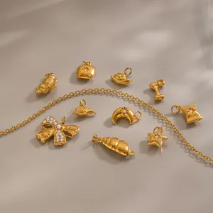 Assortimento di ciondoli in acciaio inossidabile placcato oro 18K in varie forme di animali