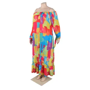 Detailed view of colorful off-shoulder printed bohemian maxi dress with ruffled hemline