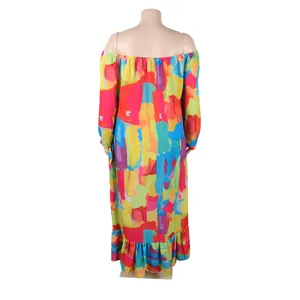 Back view of a colorful abstract print off-the-shoulder maxi dress with ruffled hem