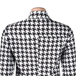 Detailed back view of houndstooth dress collar with sharp black and white patterns.