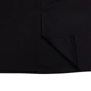 Detail of professional stitching and hemline on a elegant black plus size long sleeve dress