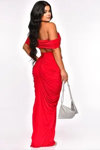 Elegant red two-piece evening set with off-shoulder top and ruched maxi skirt detail