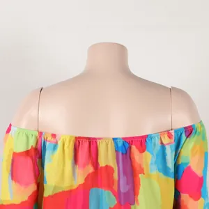 Detailed back view of off-the-shoulder dress with vibrant colorful abstract print