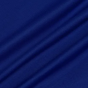 Primer plano macro de tela acanalada azul oscuro de alta calidad para pantalones.