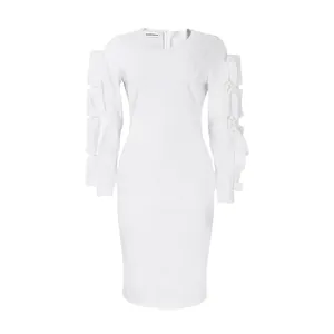 Detail view of white plus size long sleeve dress featuring tiered ruffled sleeves.