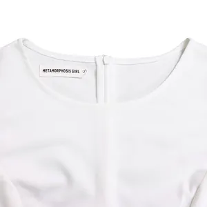 Close-up detail of a professional white round neck dress with back zipper and brand label