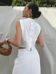 Elegant white linen sleeveless top and maxi skirt two-piece set for summer