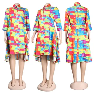 Detail of colorful abstract print midi dress with collar and three-quarter sleeves