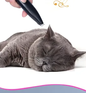 Professional low-noise cordless pet hair trimmer trimming a sleeping cat's ear fur