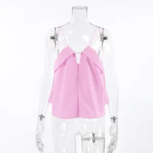 Pink linen camisole with deep V-neck and folding detail on transparent mannequin
