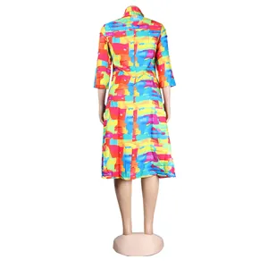 Back view of a vibrant colorful abstract print slim-fit dress with lapel collar
