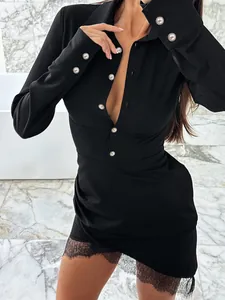 Elegant black slim-fit long-sleeve mini dress with lace hem and pearl button detailing