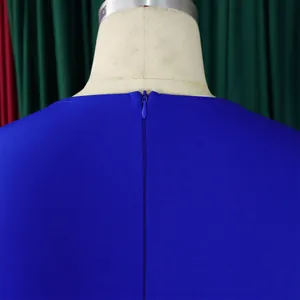 Close-up detail of a royal blue dress featuring a concealed back zipper for a sleek look.