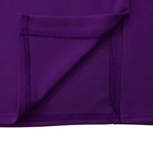 Gros plan macro des coutures de haute qualité sur l'ourlet d'une robe violette