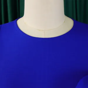 Macro view showing the round neckline detail of a royal blue solid color dress