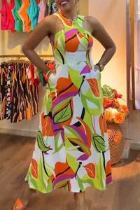 Vibrant abstract leaf print sleeveless halter maxi dress with functional side pockets