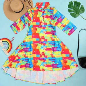 Vibrant multi-color abstract print dress featuring a turn-down collar and button detail