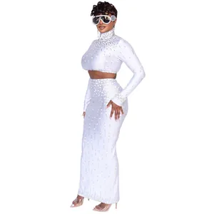 Witte met strass versierde tweedeilige bodycon jurk set voor feest en gala avond