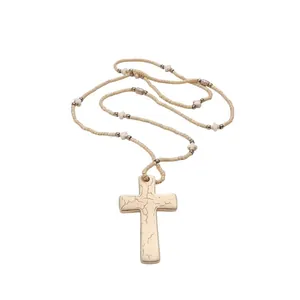 Bohemian stone beaded necklace with large gold-tone vintage cracked cross pendant
