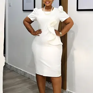 Detail of an elegant white bodycon dress with ruffles and bubble sleeves for women.