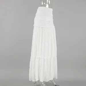 Side view of elegant white Bohemian lace maxi skirt with delicate tiered details.