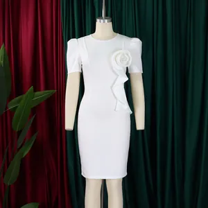 Elegant white bodycon dress featuring 3D floral ruffle detail and short sleeves.