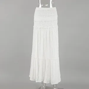 Elegant French bohemian white lace maxi skirt with a tiered A-line silhouette.