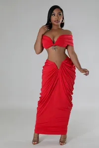Detailed macro view of the sexy red two-piece draped maxi skirt set with tube top