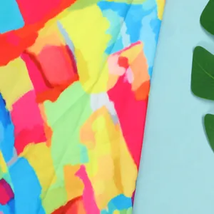 Close-up of colorful abstract oil painting pattern on slim fit dress fabric