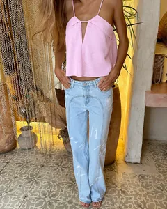 Summer sexy pink linen halter camisole paired with light blue paneled straight jeans