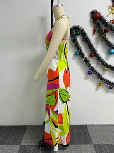 Side view of a vibrant tropical floral print sleeveless bodycon maxi dress on a mannequin