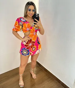 Floral print cut-out jumpsuit skirt with ruffle sleeves shown in full-length mirror selfie