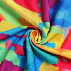 Macro detail shot showing the soft texture and vibrant tie-dye pattern of this colorful fabric