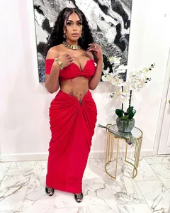 Elegant red two-piece pleated maxi skirt set with sexy off-shoulder crop top detail