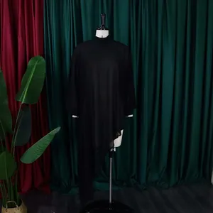 Full view of the stylish irregular long hemline on a loose black chiffon dress