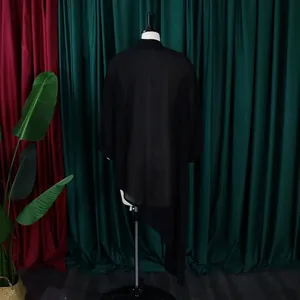 Back view of a black chiffon dress with a loose fit and irregular hem detail