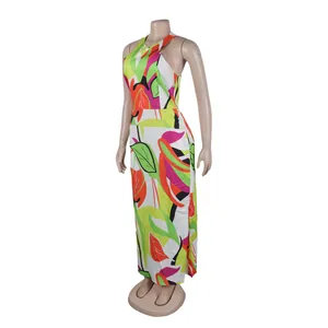 Close-up view of a vibrant tropical print sleeveless maxi dress on a slim mannequin
