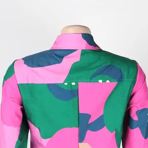Close-up macro view showing the colorful abstract pattern on the back of the dress.